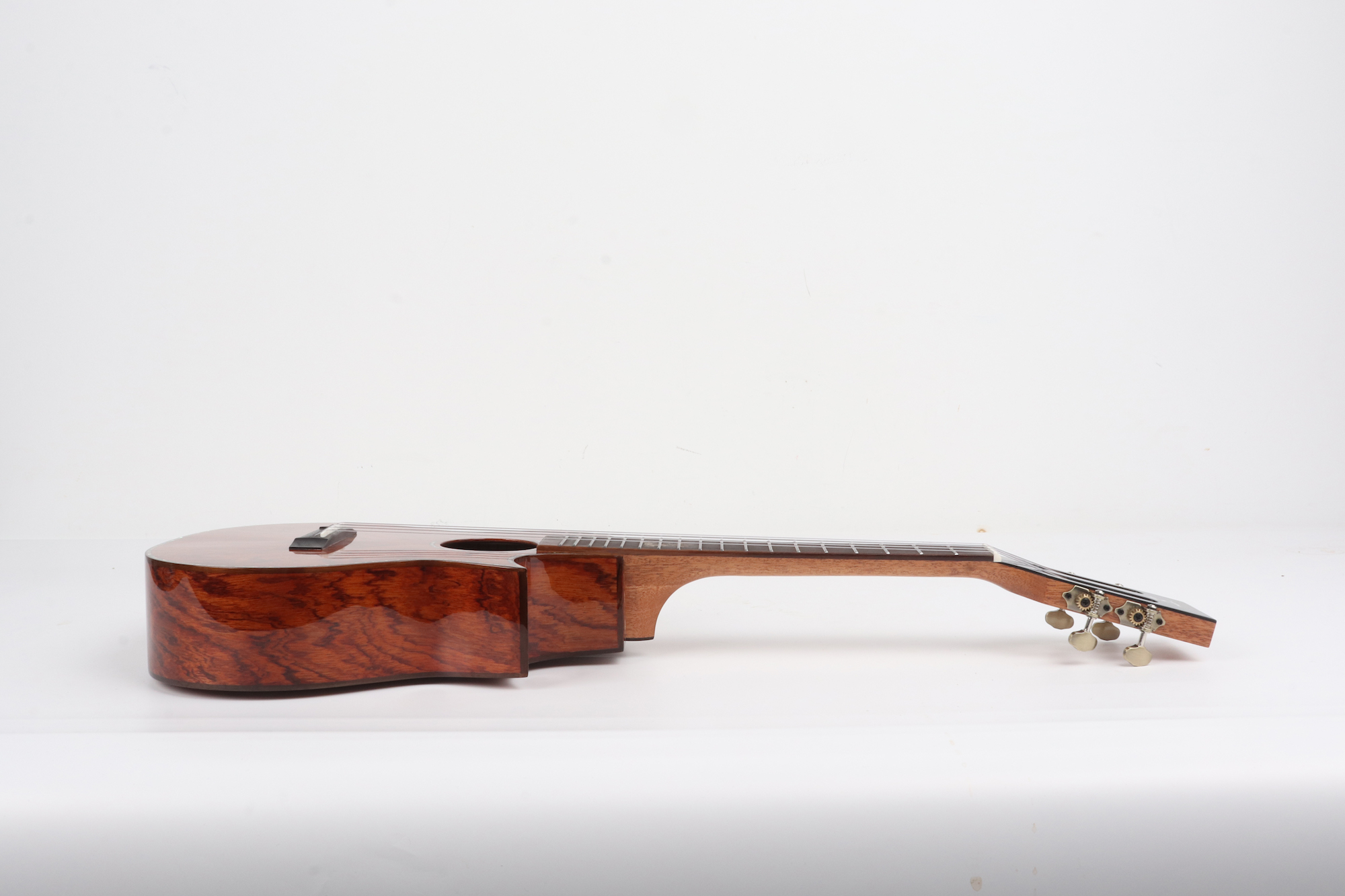Padauk wood ukulele cutaway